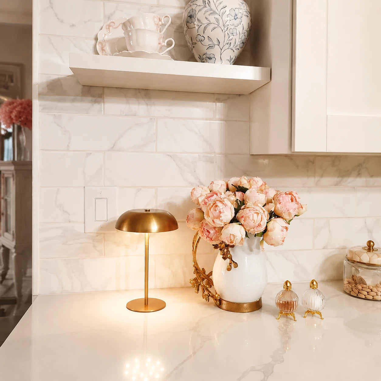 Portable, architectural brass lighting for an effortless transition across the home, perfect for a dining centerpiece, study, or minimalist lounge area.